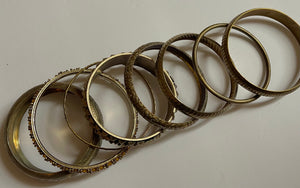 Set of 8 Vintage Brassy Gold Tone Bracelets.