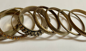 Set of 8 Vintage Brassy Gold Tone Bracelets.