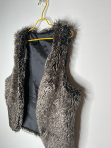 There’s no age for glamorous..  Kid faux vest size 10