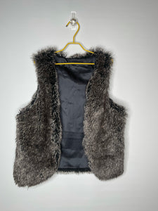 There’s no age for glamorous..  Kid faux vest size 10